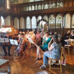 Norfolk Camerata (as North Norfolk Chorale) rehearsing in Blakeney Church Summer 2018